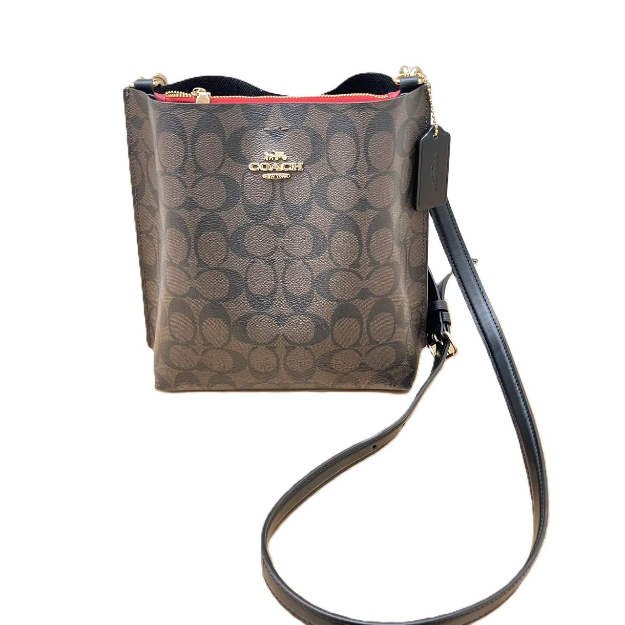 コーチ　モリー バケット バッグ 22 シグネチャー キャンバス　CA582