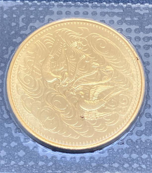 天皇陛下御座位60年記念10万円金貨